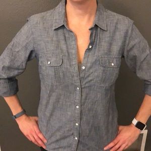 Cute chambray button down with pocket details.